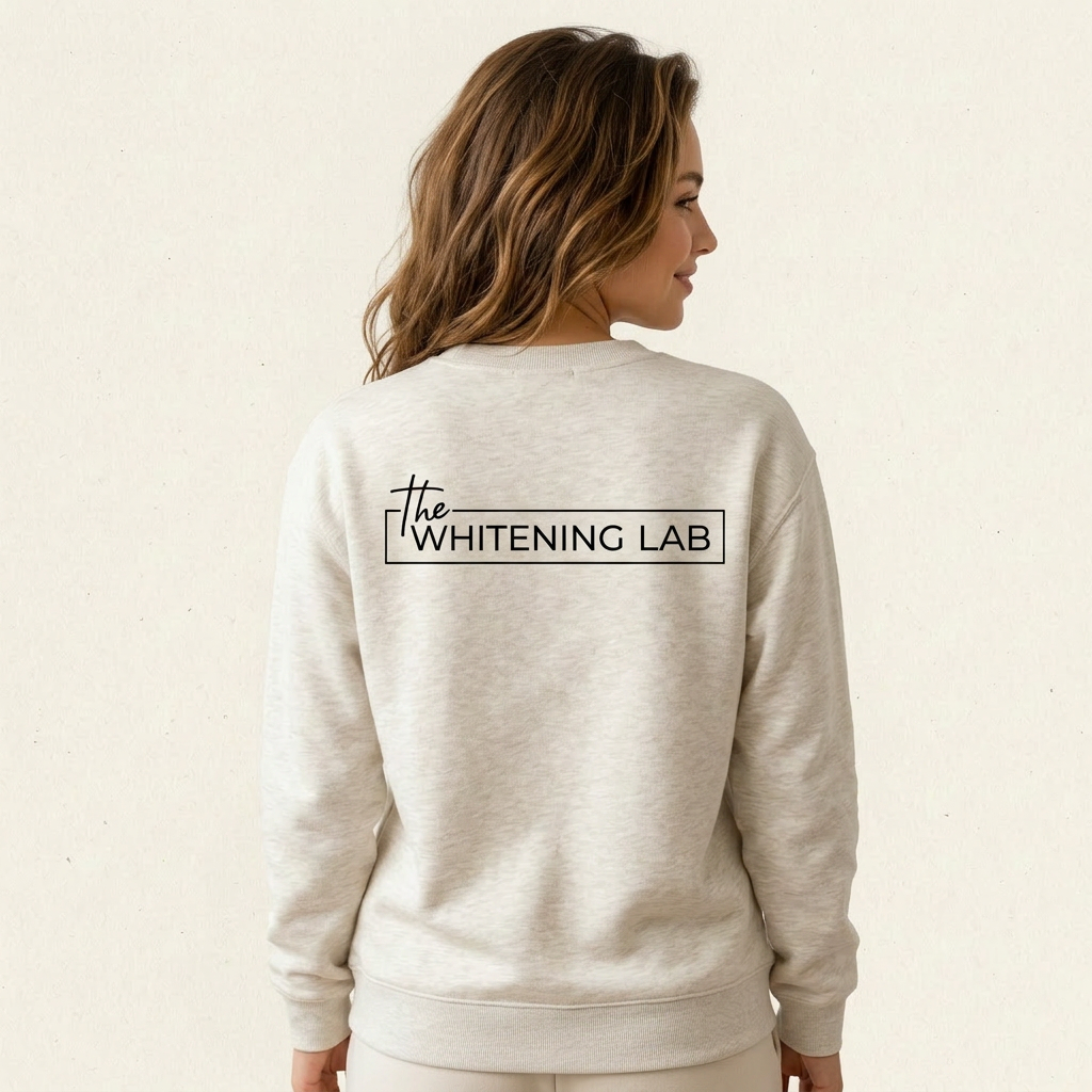 Beige Whitening Lab sweatshirt on model — back with large logo